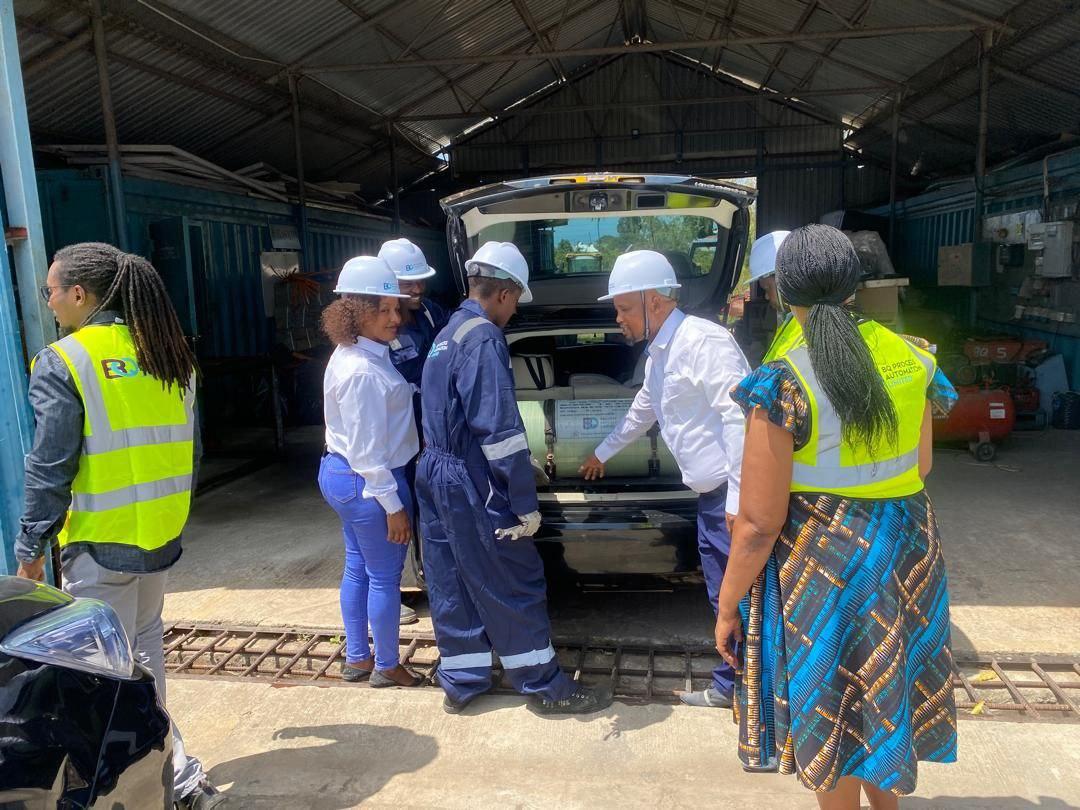 BQ certified technicians performing engine maintenance on a vehicle